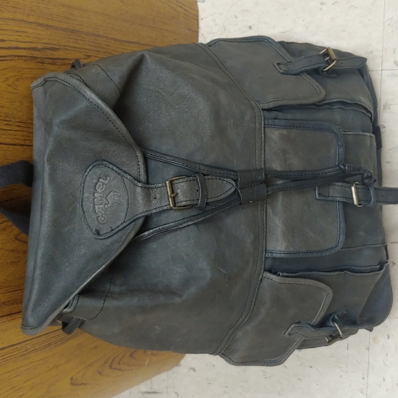 Camel Handbags - Vintage Camel cigarette brand leather backpack. New condition.  Collectors item!